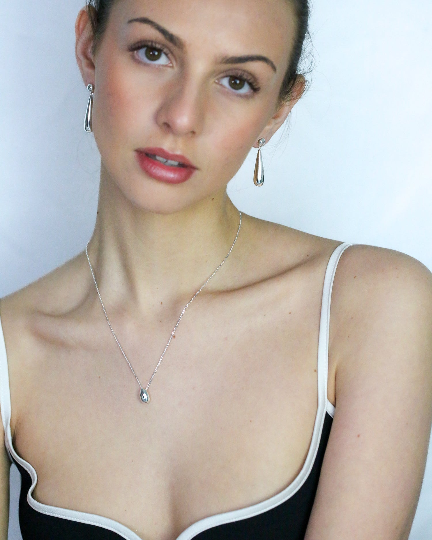 Solace Drop Earrings In Silver